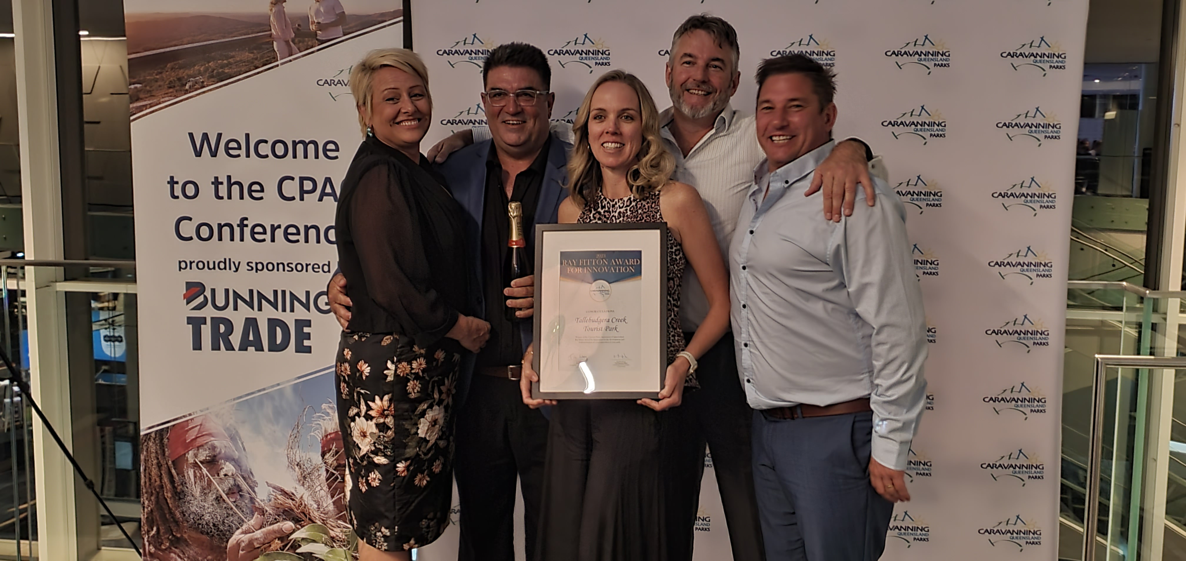 The Tallebudgera Creek Tourist Park Team with their award at the 2023 CPAQ Awards night.